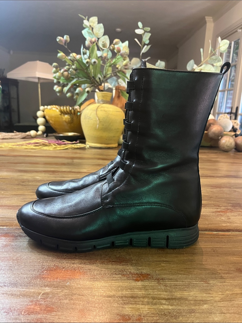 Black leather mid-calf boots by Amalfi.